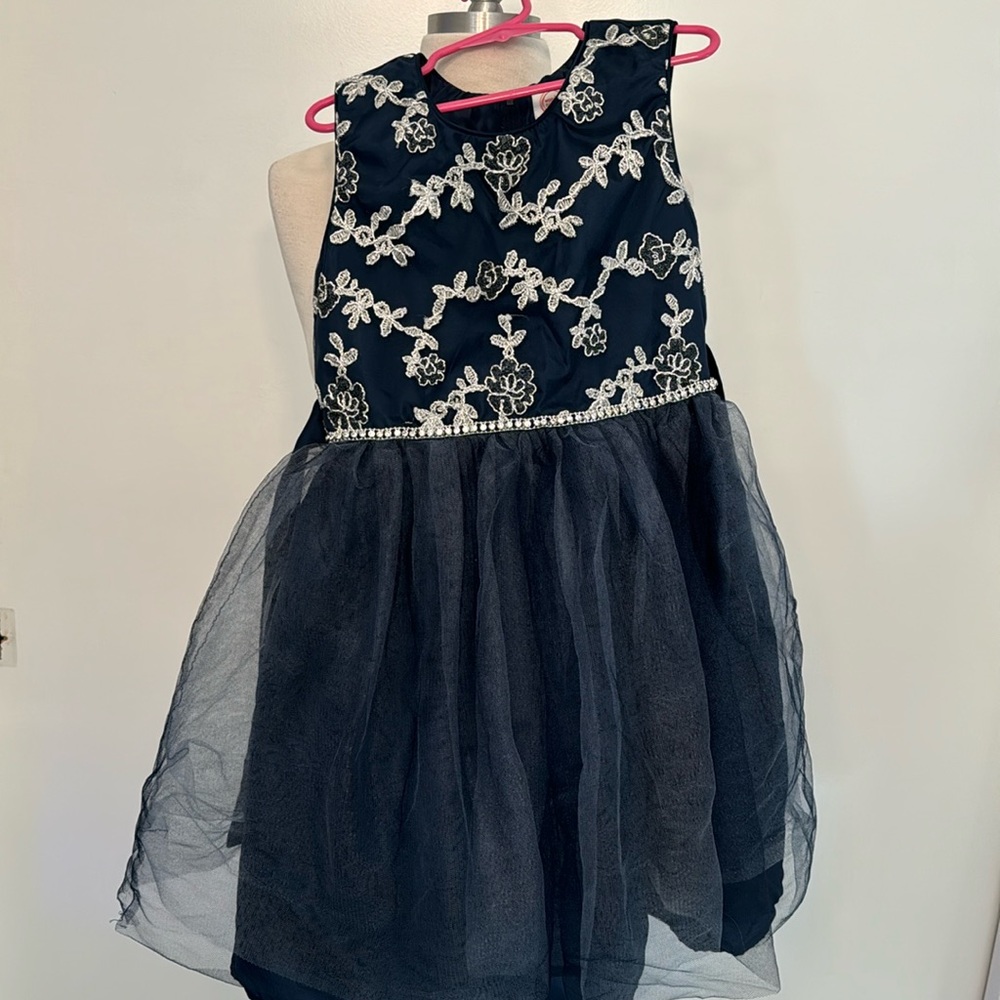 Navy dress with flower design on top